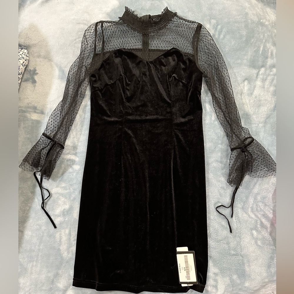 Black size 8 designer BURRYCO dress. Never worn with tags. Polyester.
